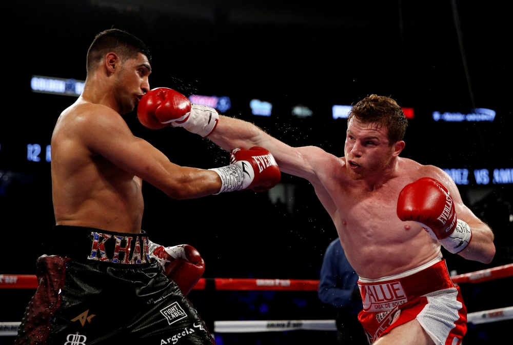 Canelo Alvarez and Amir Khan in action during the BC Middleweight title bout at the T-Mobile Arena, Las Vegas, United States, in this file photo. — Reuters 