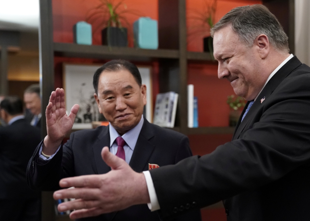 US Secretary of State Mike Pompeo stands with Vice Chairman of the North Korean Workers’ Party Committee Kim Yong Chol, North Korea's lead negotiator in nuclear diplomacy with the United States, for talks aimed at clearing the way for a second US-North Korea summit as they meet at a hotel in Washington on Friday. — Reuters