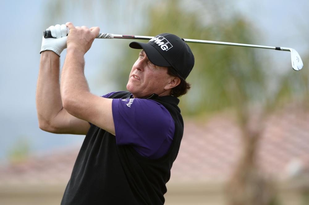 Phil Mickelson plays his shot from the third tee during the second round of the Desert Classic Golf Tournament at PGA West - Nicklaus Tournament Course at La Quints in California Friday. — Reuters