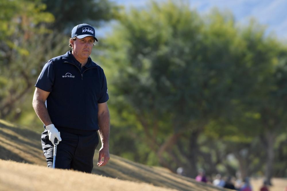 Phil Mickelson of the US looks on at the 1st fairway during the third round of the Desert Classic at the Stadium Course in La Quinta, California, Saturday. — AFP 