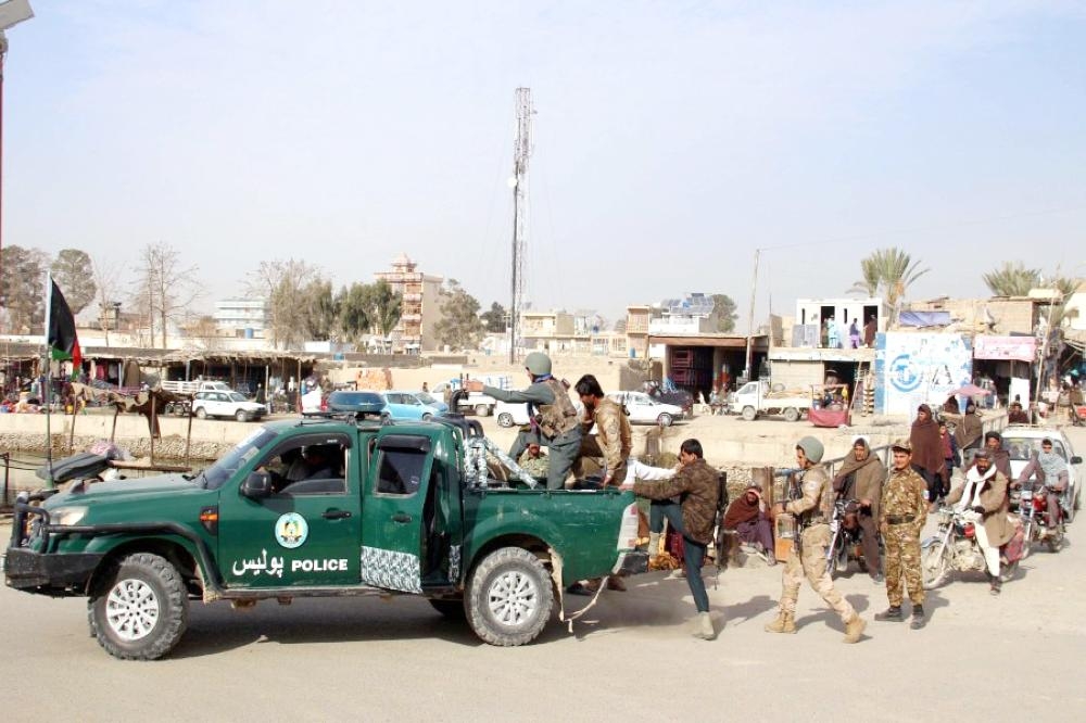 


Afghan security officials patrol in Helmand, Afghanistan. Security forces have destroyed several Taliban facilities in Helmand during an operation in Garamser district. Since the end of the NATO combat mission in Afghanistan in 2015, the Afghan government has steadily lost territory to the Taliban and currently controls just 56 percent of the country. — Courtesy photo