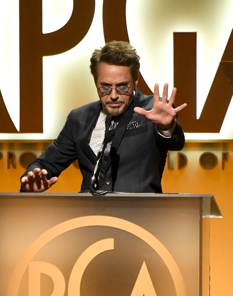 Robert Downey Jr. speaks onstage during the 30th annual Producers Guild Awards at The Beverly Hilton Hotel on Saturday in Beverly Hills, California. — AFP