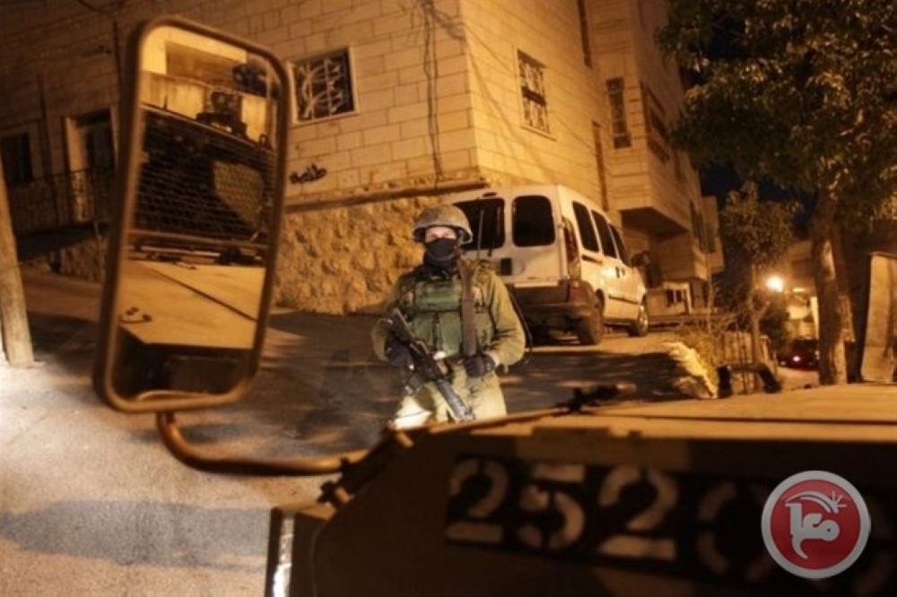 


Israeli forces conduct a raid in the West Bank on Monday. — Courtesy photo