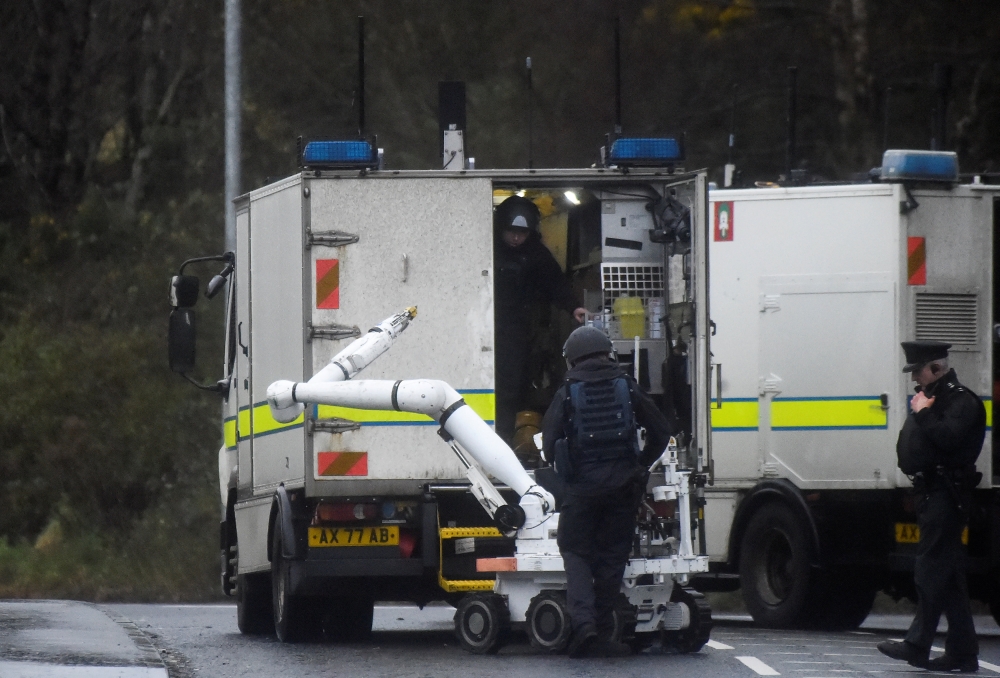 Special forces disembark an army bomb disposal robot from a truck at the scene of a security alert in Southway, Londonderry, Northern Ireland, on Monday. — Reuters