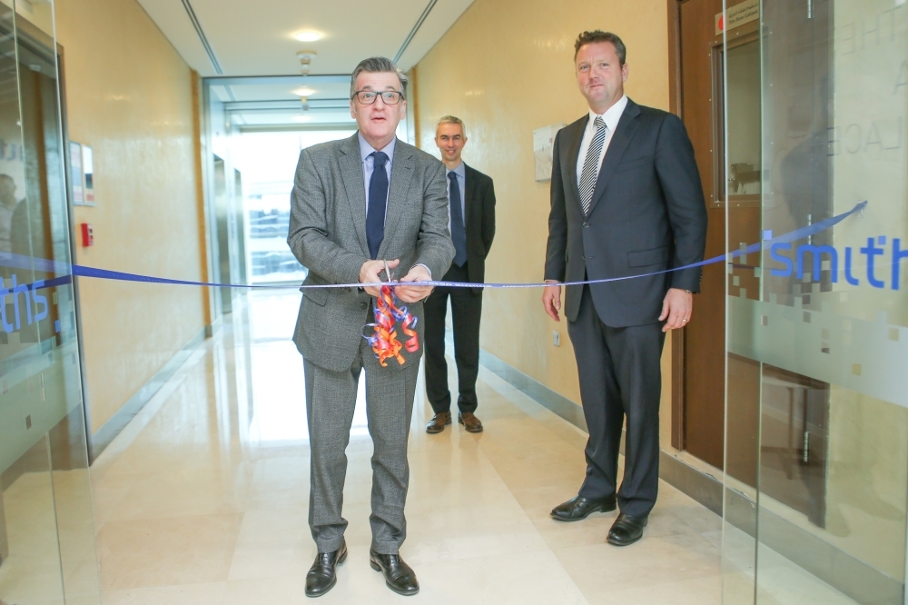 Roland Carter, Global President of Smiths Detection, cuts the ceremonial ribbon 