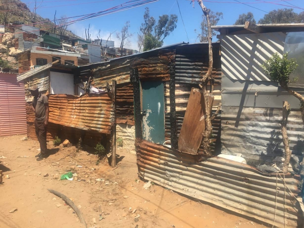Shacks with walls damaged by fire are seen in the Imizamo Yethu settlement near Cape Town, South Africa, in this Oct. 25, 2018 file photo. — Reuters