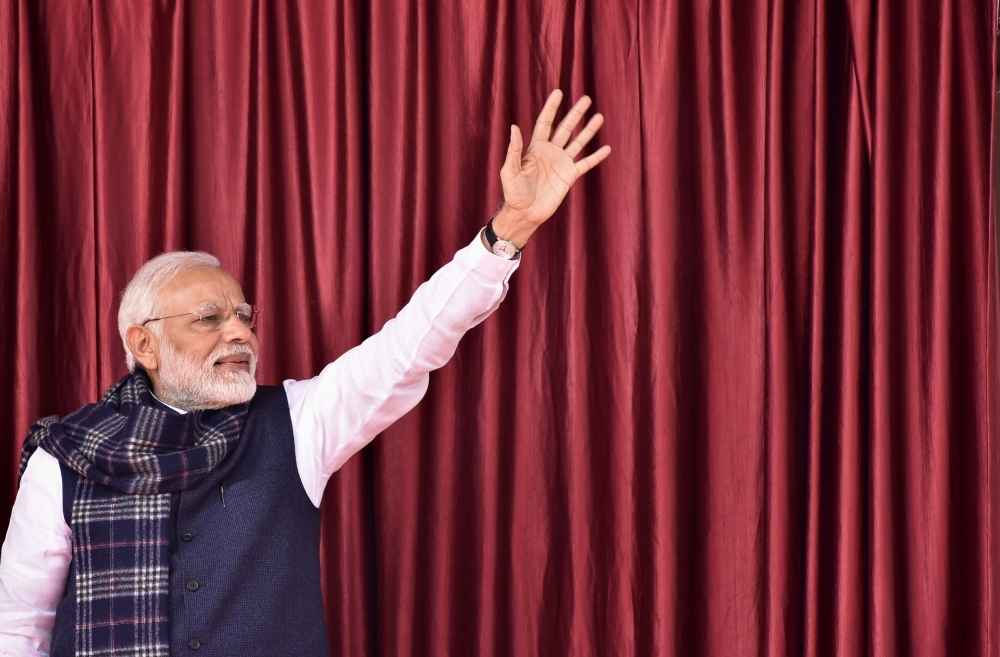 Indian Prime Minister Narendra Modi waves to the crowd during a campaign sweep through eastern Jharkhand state to inaugurate development projects in this Jan. 5, 2019 file photo. — AFP