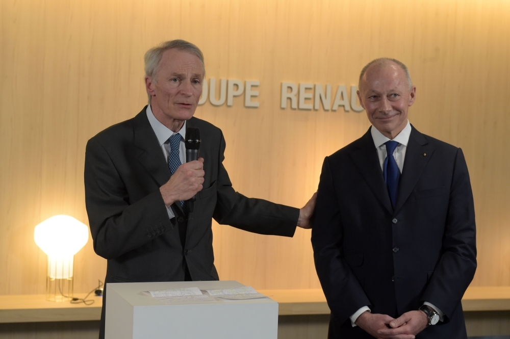 French carmaker Renault's newly appointed board chairman Jean-Dominique Senard (L) delivers a speech next to new chief executive Thierry Bollore during a press conference at the headquarters of the French car manufacturer Renault in Boulogne Billancourt, near Paris on Thursday. — AFP