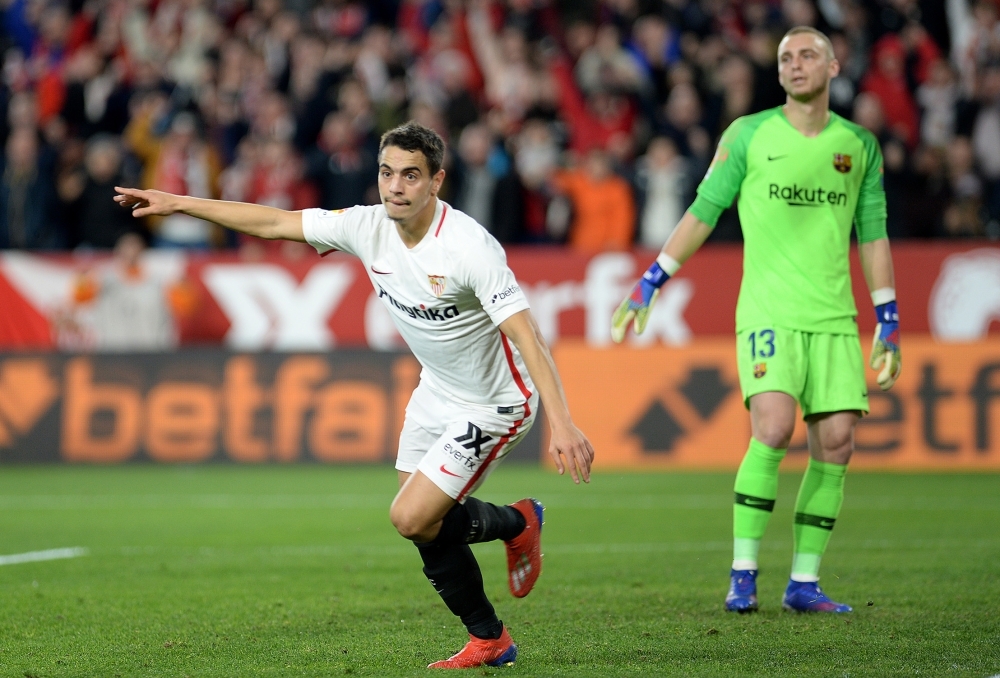 Sevilla's French forward Wissam Ben Yedder (L) celebrates after scoring his team's second goal during the Spanish Copa del Rey (King's Cup) quarterfinal first leg football match at the Ramon Sanchez Pizjuan stadium in Seville on Wednesday. — AFP