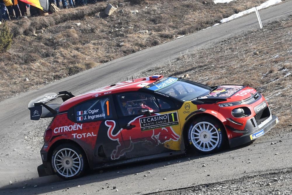 France's Sebastien Ogier and his co-pilot Julien Ingrassia steer their Citroen C3 WRC during the ES 10 of the third stage of the 87th Monte Carlo Rally Saturday. — AFP 