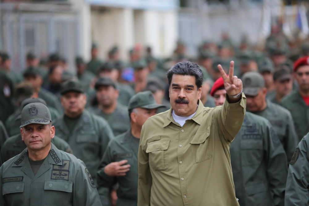 Venezuela's President Nicolas Maduro gestures during a meeting with soldiers at a military base in Caracas, Venezuela on Wednesday. — Reuters