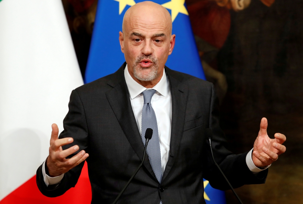 Italian oil major Eni's CEO Claudio Descalzi gestures during a news conference to present an agreement on research in alternative fuels and carbon-cutting technologies in Rome, Italy, in this file photo. — Reuters