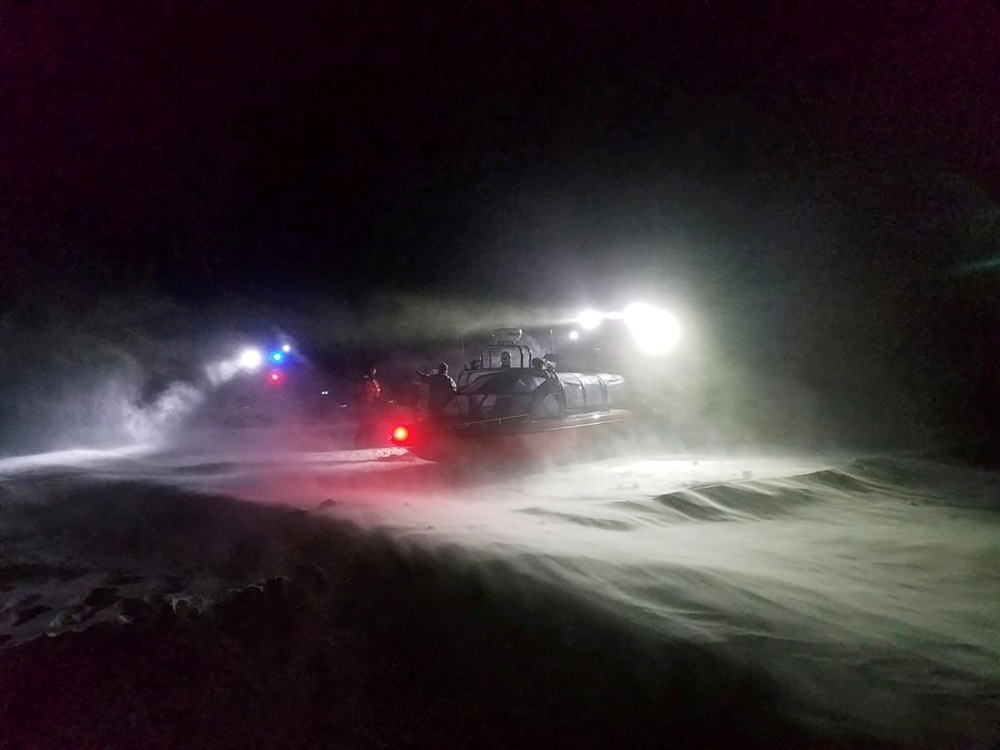 U.S. Coast Guard Station Sturgeon Bay and Department of Natural Resources crews direct seven stranded ice fishermen into airboats, in polar vortex weather system temperatures of minus 4 degrees Fahrenheit (-20 C) with a wind chill factor of minus 30 degrees (-34 C) near Sturgeon Bay, Wisconsin, in this Jan. 29, 2019 file photo. — Reuters