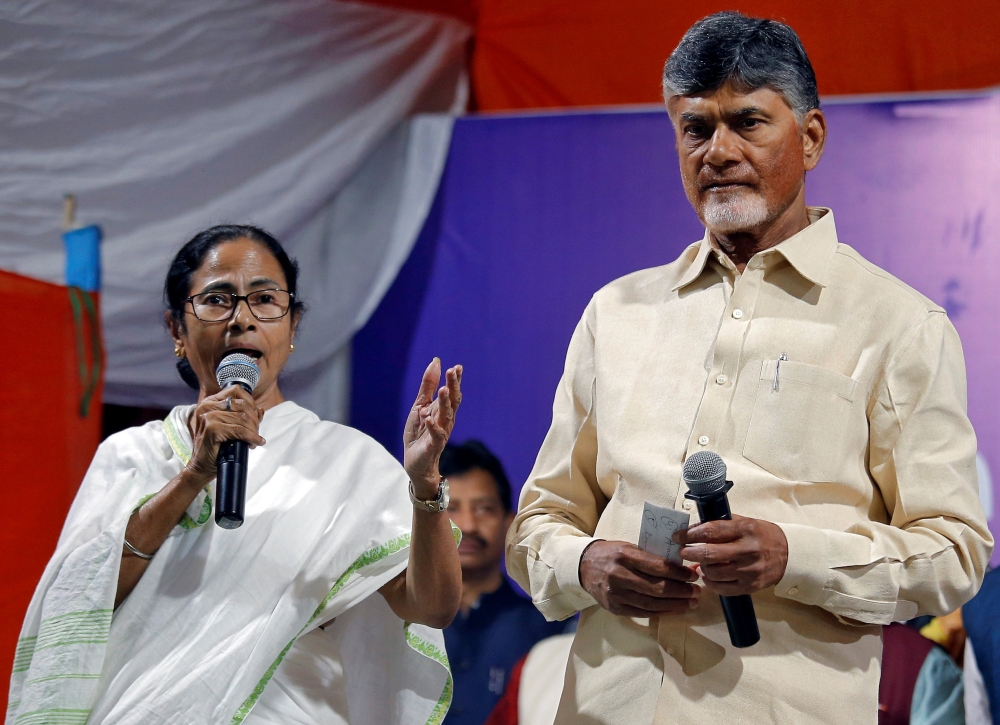 Mamata Banerjee (L), chief minister of the eastern state of West Bengal, flanked by N Chandrababu Naidu, chief minister of the southern state of Andhra Pradesh, calls of sit-in protest in Kolkata, India, Tuesday. — Reuters