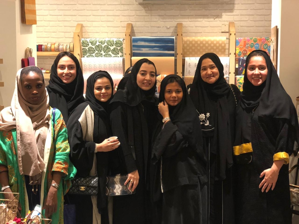 


Rawan Khogeer celebrates the first anniversary of Rawan Stationery Store’s opening with Dar Al-Hekma president, staff and students.