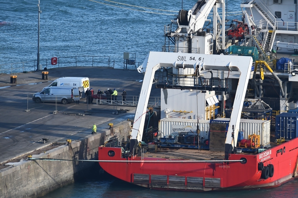 A body is taken off the Geo Ocean III, recovered from the wreckage of a plane carrying Argentine footballer Emiliano Sala at Weymouth harbour, south west England on Thursday. Investigators recovered a body in the Channel and transported it to Britain today for identification. — AFP