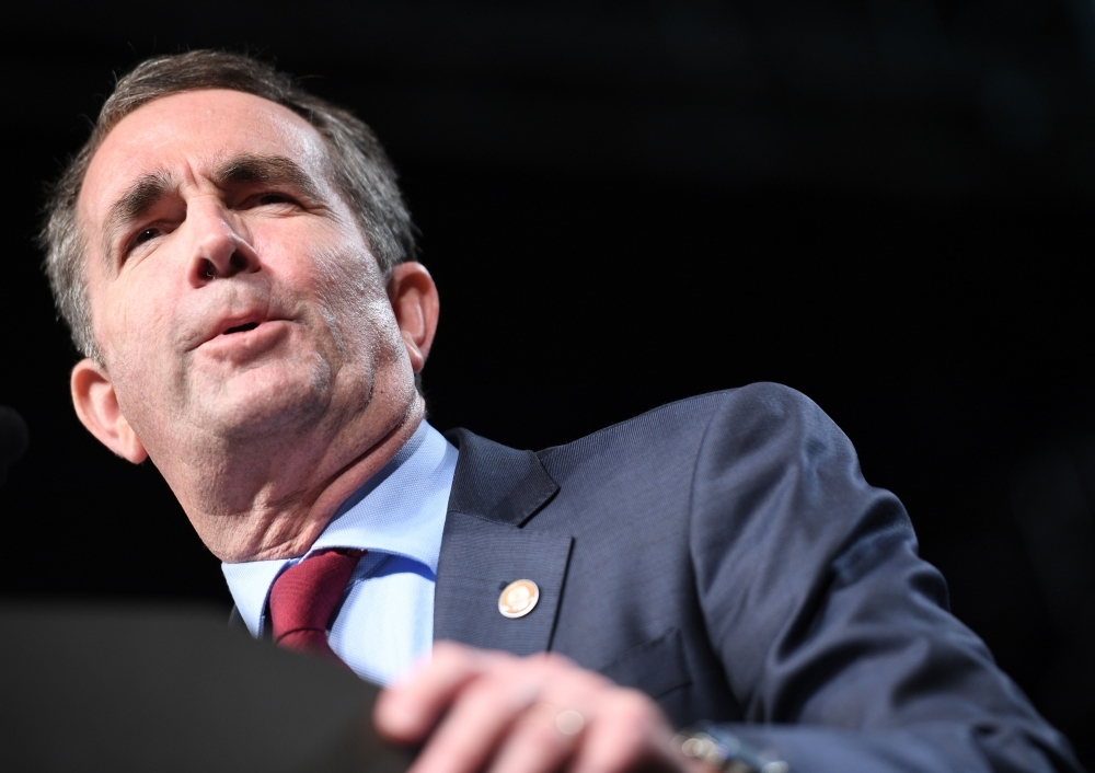 In this file photo Democratic Gubernatorial Candidate Ralph Northam speaks during a campaign rally in Richmond, Virginia. At the bottom of rarely opened drawers or cardboard boxes in attics are time bombs for Americans who have chosen careers in the public spotlight: school yearbooks. One of these famous yearbooks is threatening to cost the Democratic Governor of Virginia, Ralph Northam, his job. Another failed to derail the entry into the US Supreme Court of conservative Judge Brett Kavanaugh. — AFP