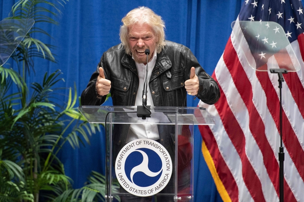 Virgin Galactic founder Sir Richard Branson speaks during a ceremony to award test pilots  Mark 