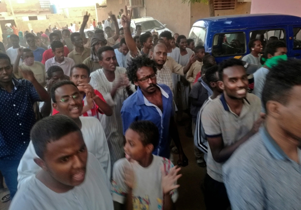 Sudanese protesters take part in an anti-government demonstration east of the capital Khartoum on Friday. — AFP