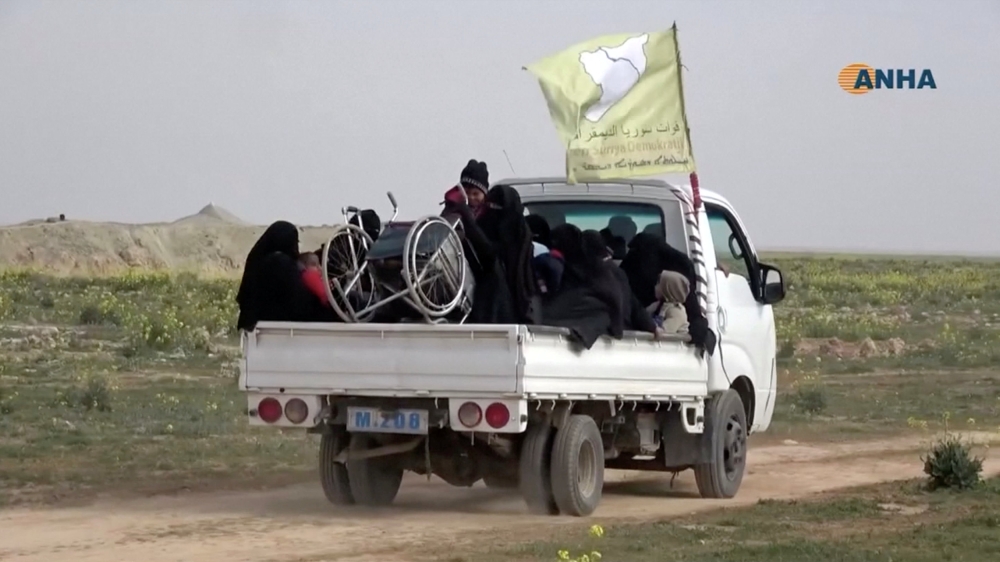 


Civilians are seen in the back of a Syrian Democratic Forces (SDF) truck said to be near Baghouz, Deir El-Zor province, Syria in this still frame taken from a video said to be shot on Sunday. — Reuters