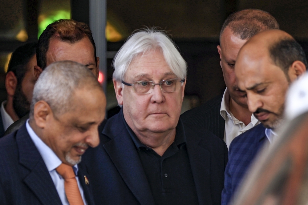 Martin Griffiths (C), the UN special envoy for Yemen, arrives at Sanaa international airport on Monday.  — AFP