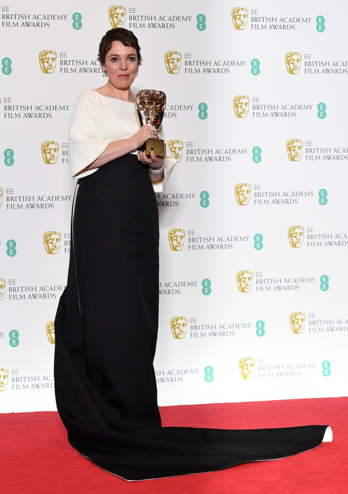Olivia Colman holds the award for leading actress for her performance in 'The Favourite' at the British Academy of Film and Television Awards (BAFTA) at the Royal Albert Hall in London. — Reuters