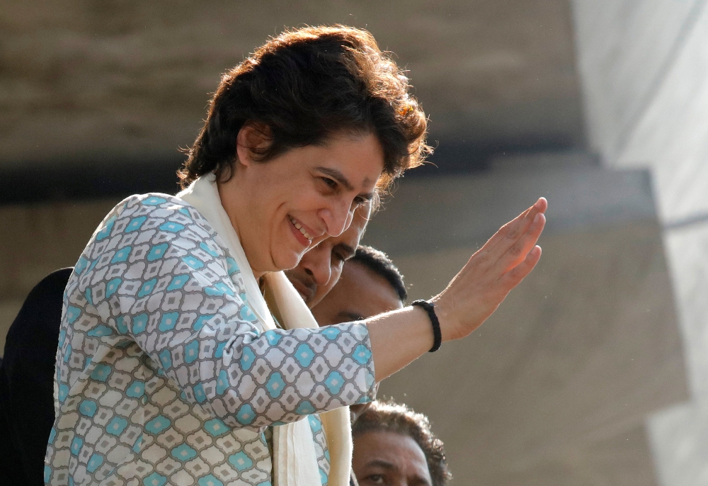 Priyanka Gandhi Vadra, a leader of India’s main opposition Congress party and sister of the party president Rahul Gandhi, waves to her supporters during a roadshow in Lucknow, India, on Monday. — Reuters