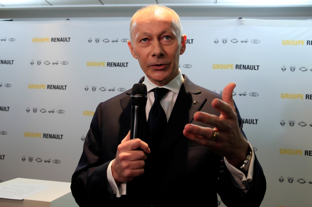 Thierry Bollore, chief executive officer of Renault, talks to journalists after French carmaker Renault's 2018 annual results presentation at their headquarters in Boulogne-Billancourt, near Paris, France, on Thursday. — Reuters