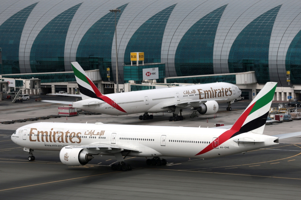 Emirates Airline planes are seen at Dubai International Airport in Dubai, United Arab Emirates, on Friday. — Reuters