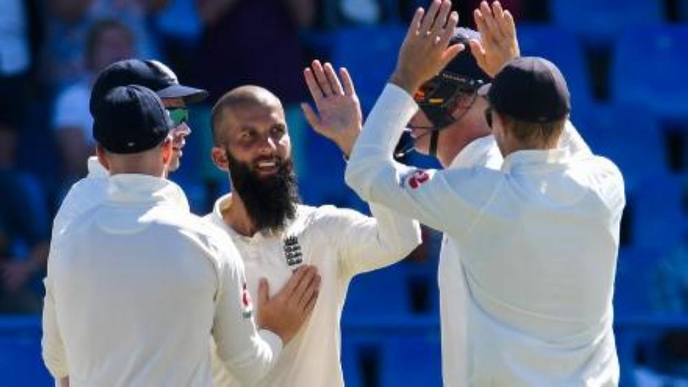 File photo shows England all-rounder Moeen Ali celebrating with his teammates.