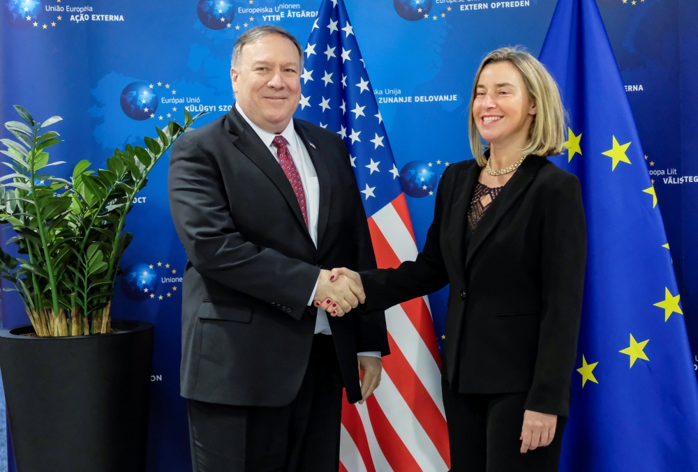 US Secretary of State Mike Pompeo poses with European Union foreign policy chief Federica Mogherini in Brussels, Belgium, on Friday. — Reuters