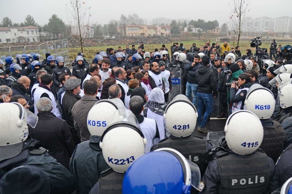 Turkish anti-riot police surround and block members of the pro-Kurdish Peoples’ Democratic Party (HDP) during a demonstration in solidarity with a HDP lawmaker on hunger strike in the Turkish city of Diyarbakir, Turkey, on Friday. — AFP