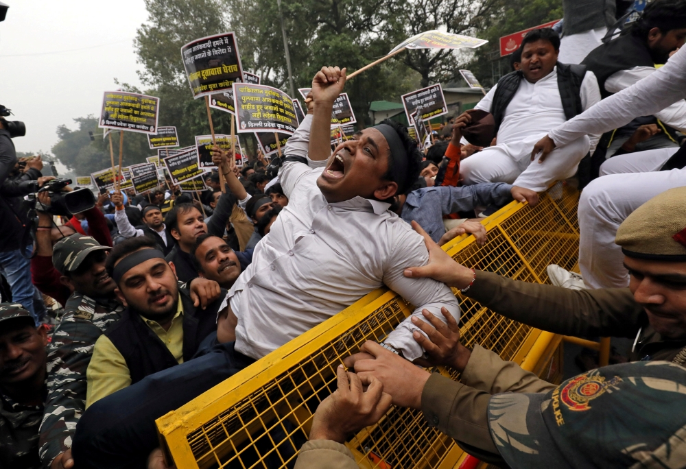 An activist of the youth wing of India's main opposition Congress party shouts slogans during a protest in New Delhi against the attack on a bus that killed 44 Central Reserve Police Force (CRPF) personnel in south Kashmir on Thursday. — Reuters