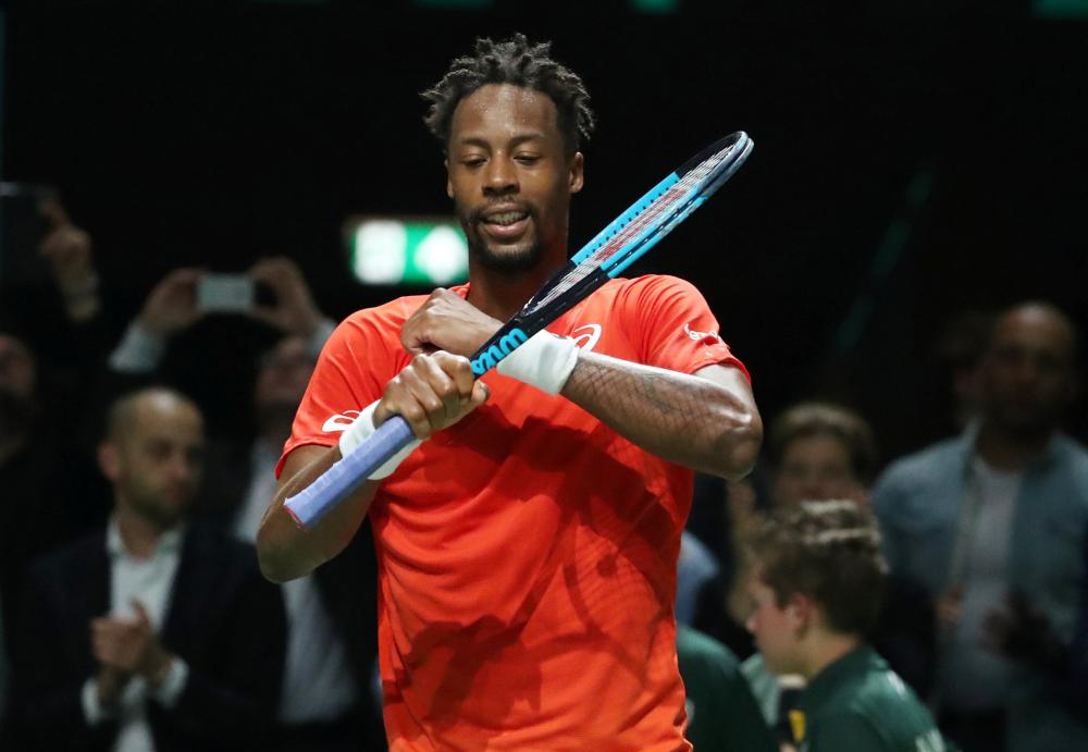 France's Gael Monfils celebrates winning his semifinal match against Russia's Daniil Medvedev at the Rotterdam Open Saturday. — Reuters