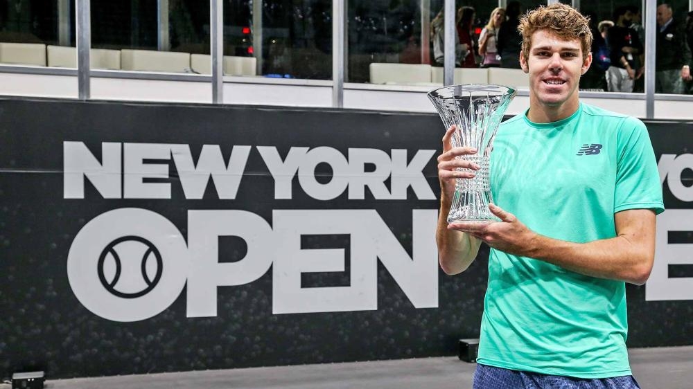 Reilly Opelka of the US with New York Open Trophy. — AFP