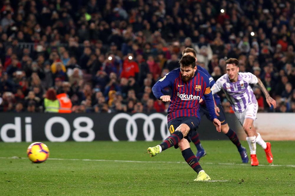 Barcelona's Lionel Messi misses a penalty at Camp Nou, Barcelona, Saturday. — Reuters