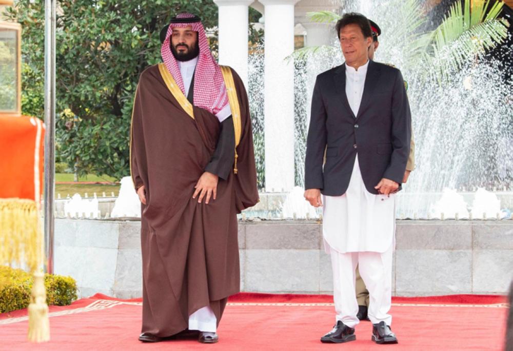 Crown Prince Muhammad Bin Salman being seen off at Noor Khan Air Base in Rawalpindi on Monday by Pakistan Prime Minister Imran Khan. — SPA 