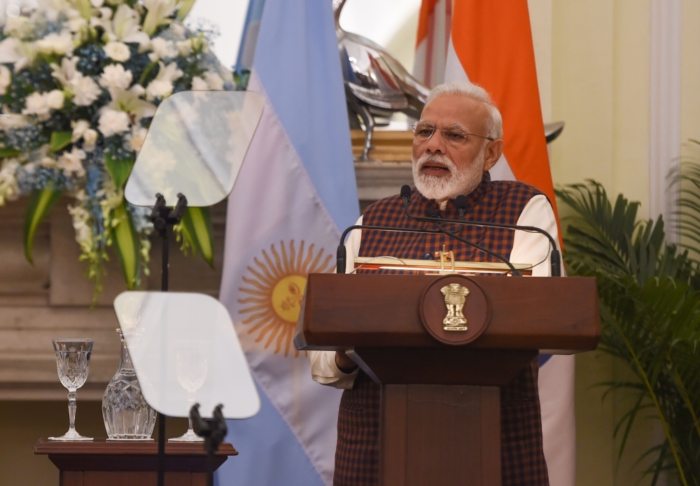 Indian Prime Minister Narendra Modi looks on during a press briefing at the Hyderabad House in New Delhi on Monday. — AFP