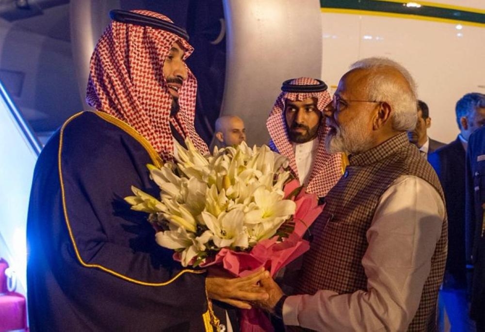 Crown Prince Muhammad Bin Salman, deputy premier and minister of defense, being received by Indian Prime Minister Narendra Modi at Air Force Station Palam airport in New Delhi on Tuesday evening. — Courtesy photo