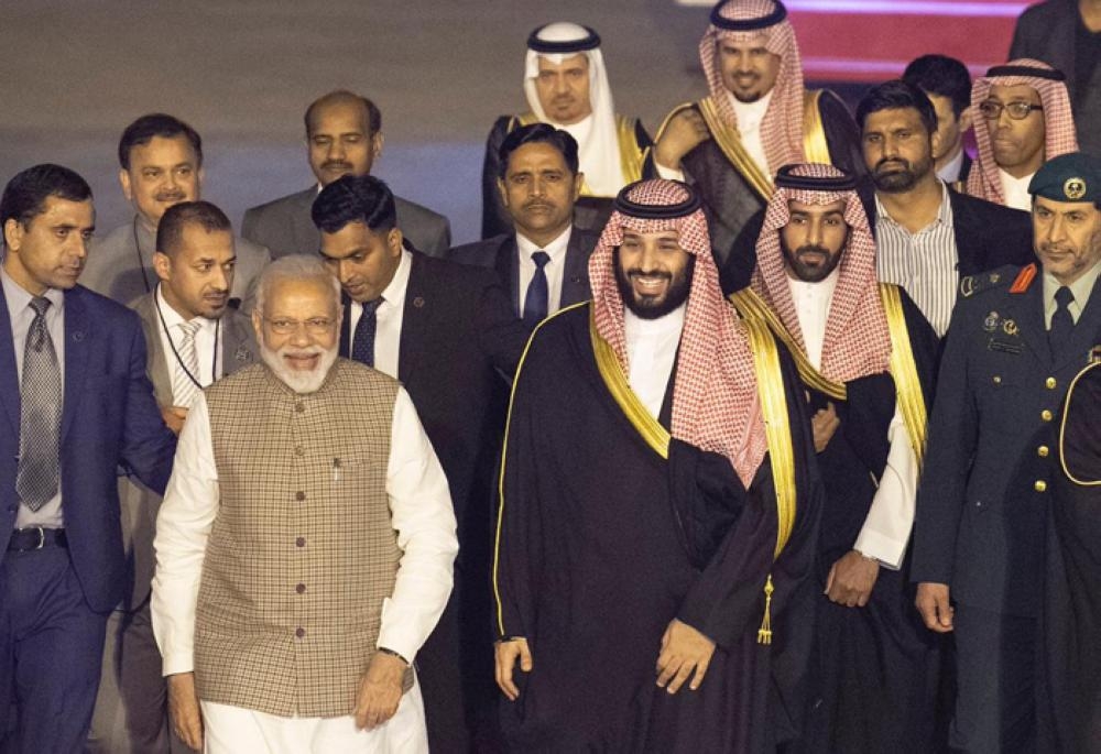 Crown Prince Muhammad Bin Salman, deputy premier and minister of defense, being received by Indian Prime Minister Narendra Modi at Air Force Station Palam airport in New Delhi on Tuesday evening. — Courtesy photo