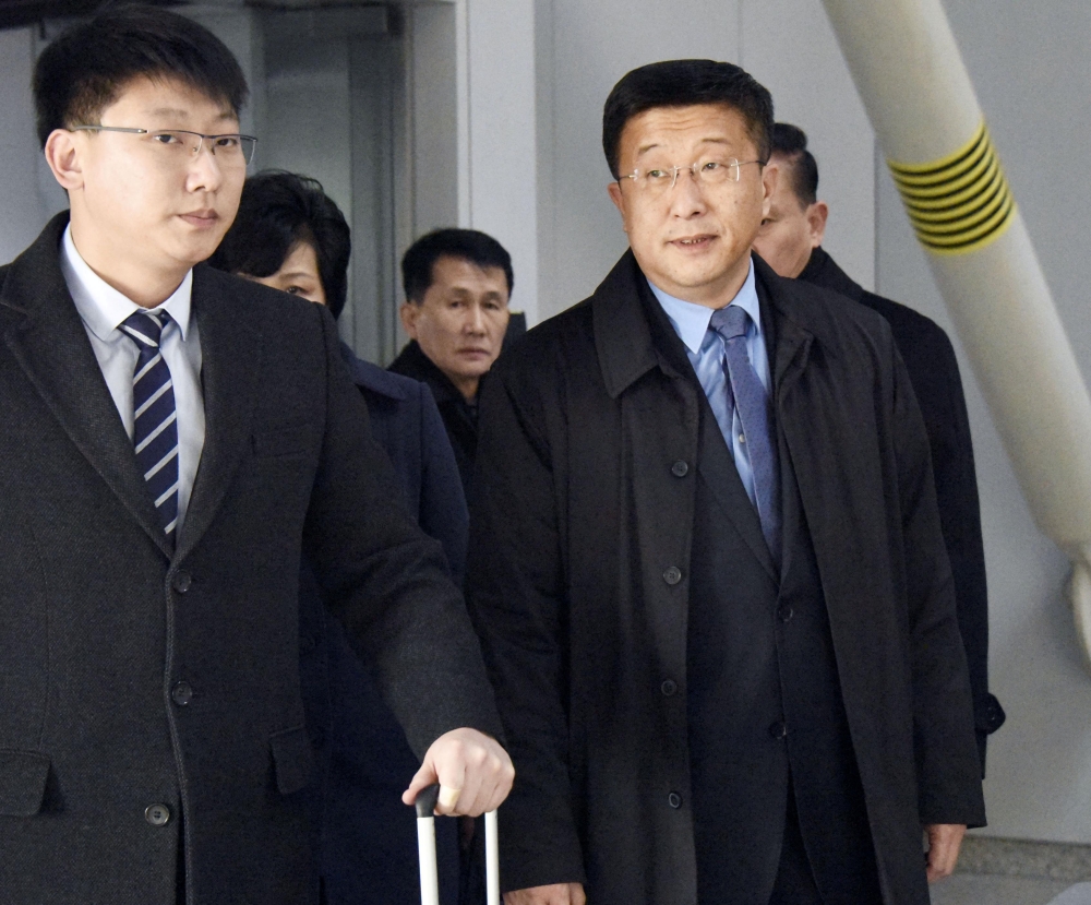 Kim Hyok Chol right, North Korea’s interlocutor leading negotiations with the United States, is pictured upon arrival at Beijing’s international airport on his way to the Vietnamese capital Hanoi, in Beijing, China, on Tuesday. — Reuters