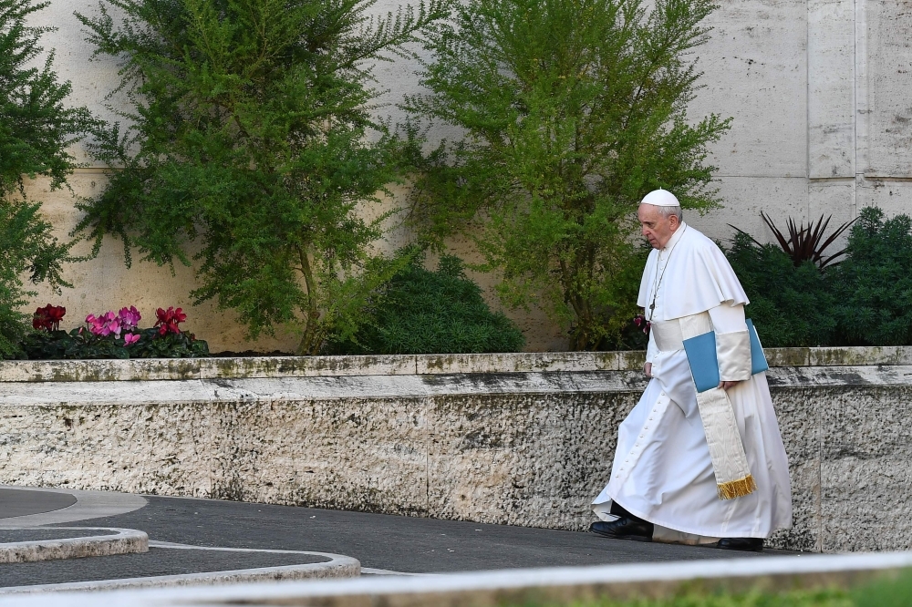 Pope Francis arrives for the opening of a global child protection summit for reflections on the sex abuse crisis within the Catholic Church at the Vatican on Thursday. — AFP