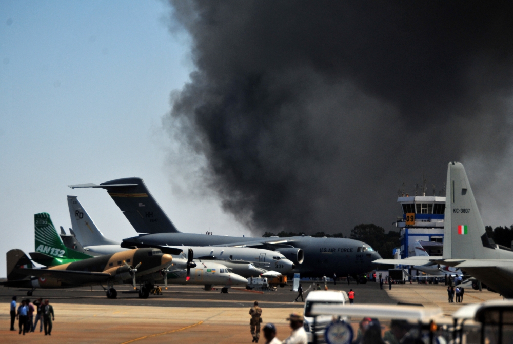 Fire at airshow in India destroys hundreds of cars