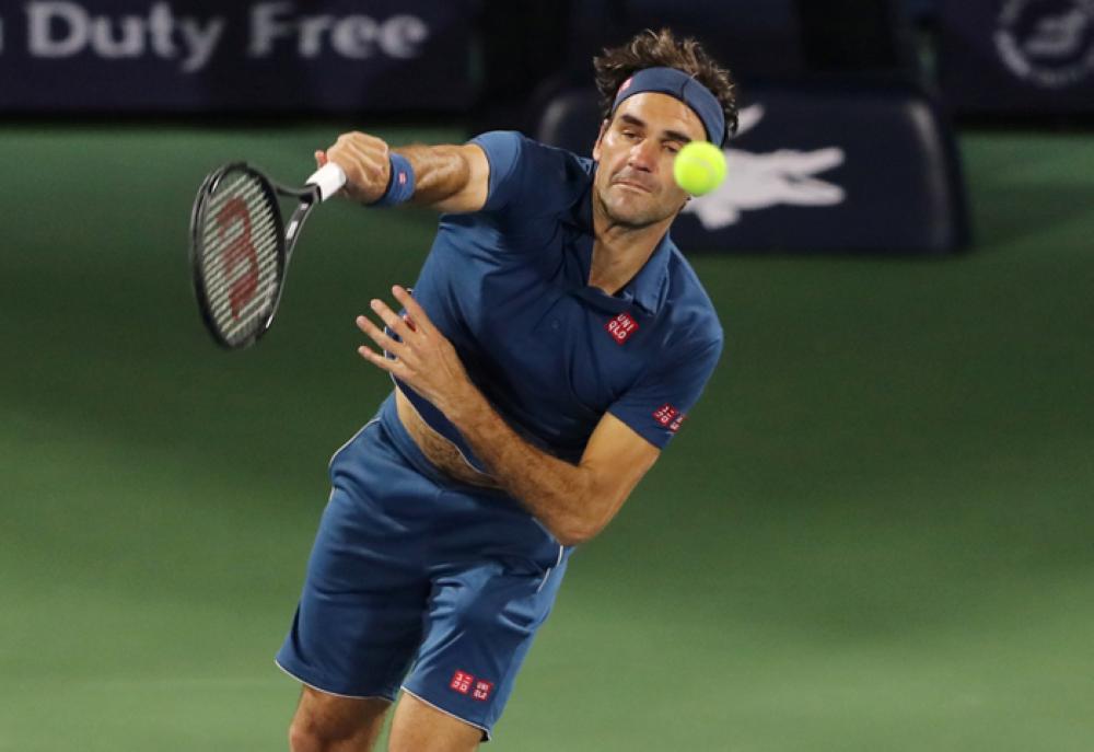 Switzerland's Roger Federer in action during his first round match against Germany's Philipp Kohlschreiber — Reuters