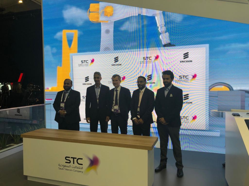 Ericsson and STC Solutions officials at the signing of the sales channel partnership agreement in Barcelona. — Courtesy photo