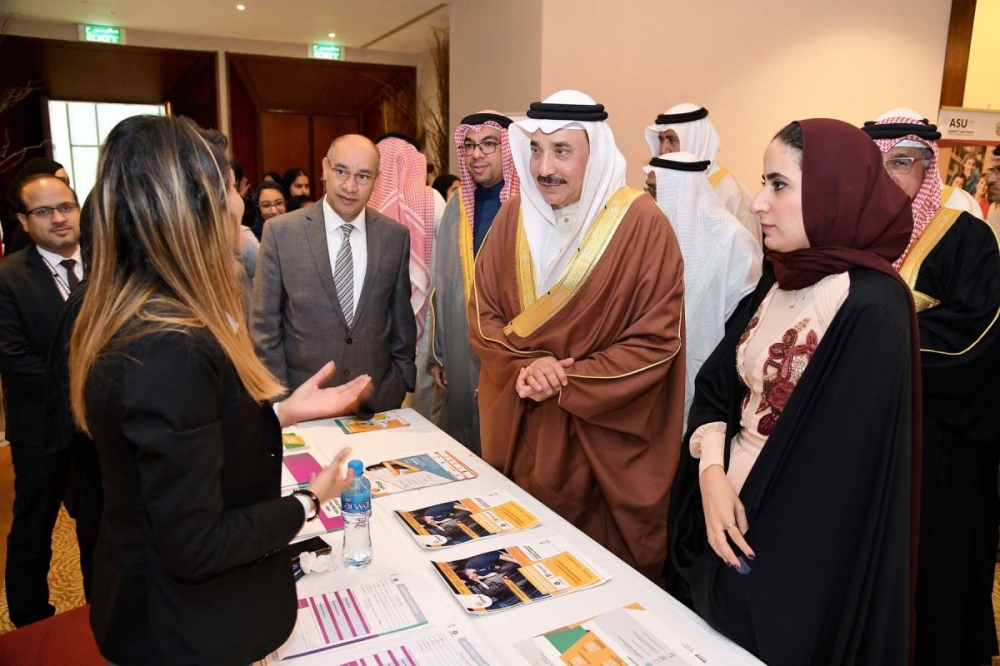 


Jameel Bin Mohammed Ali Humaidan, minister of labor and social development, visits a pavilion at the Forsati ICT Job Fair in Manama. — Courtesy photo