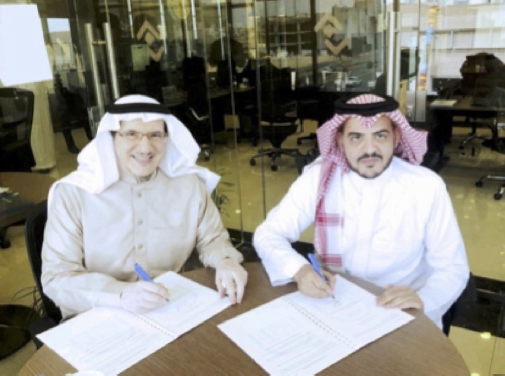 Dr. Al-Suwailem, left, with Mr. Al-Omrani, during the signing of the MoU in Riyadh, KSA. — Courtesy photo