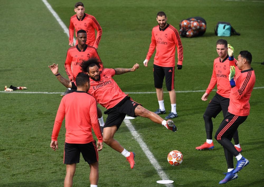 Real Madrid players attend a training session at the Valdebebas training complex in the outskirts of Madrid, Monday. — AFP 