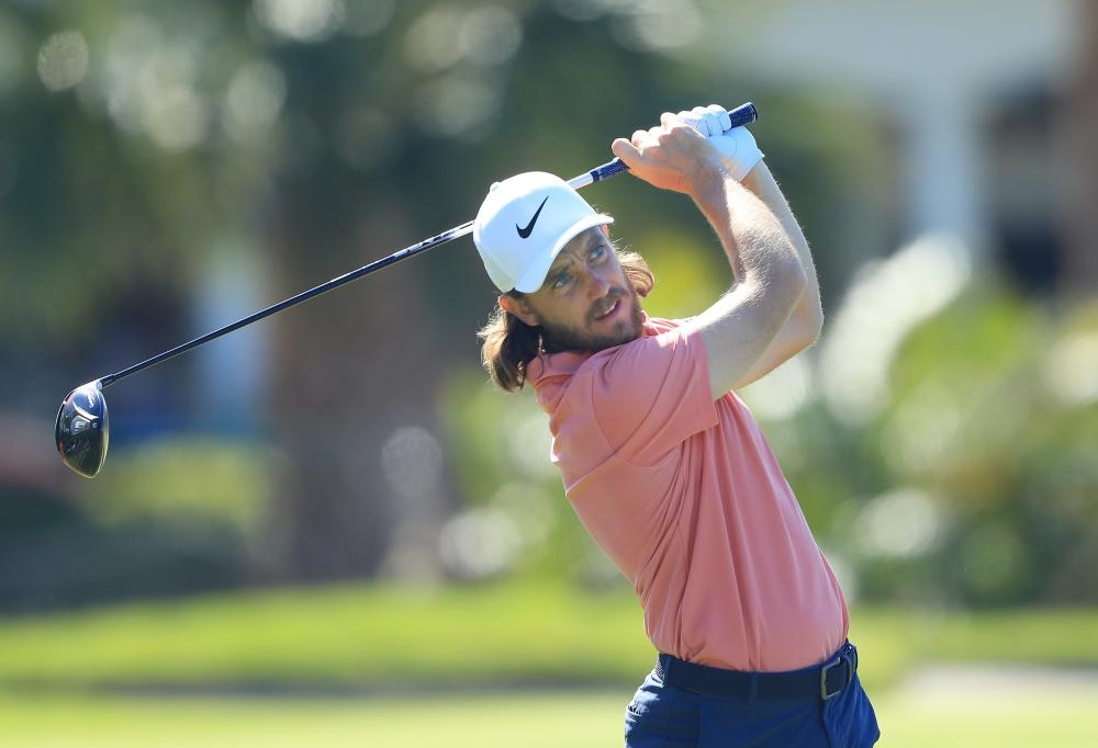 Tommy Fleetwood of England plays his shot from the 12th tee during the second round of the Arnold Palmer Invitational Presented by Mastercard at the Bay Hill Club in Orlando Friday. — AFP 