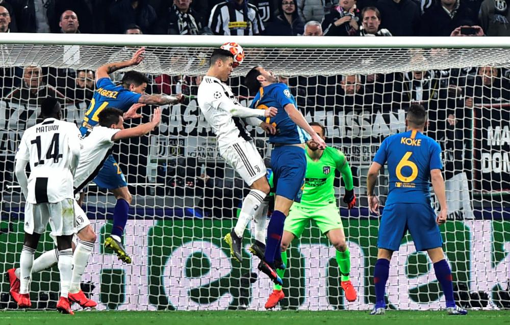 Juventus’ Cristiano Ronaldo scores their second goal against Atletico Madrid during their Champions League Round of 16 second leg match at Allianz Stadium, Turin, Tuesday. — Reuters